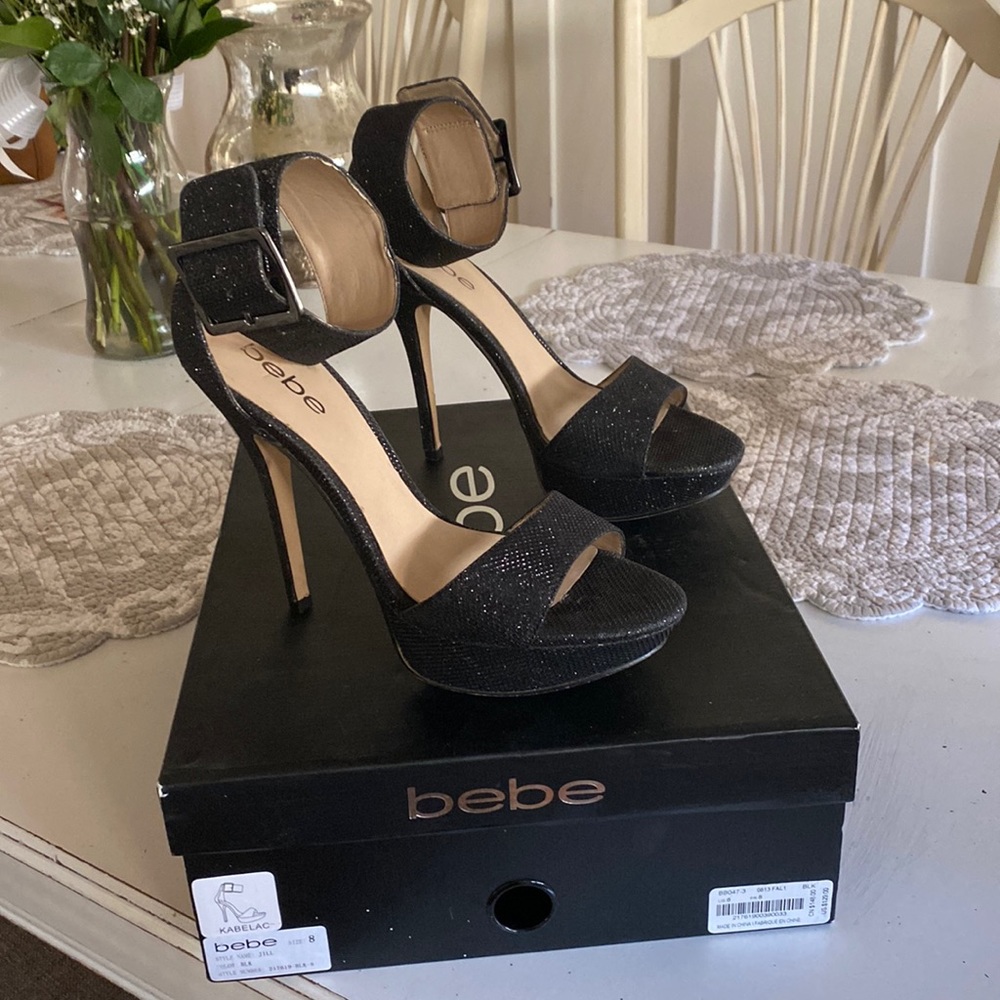Bebe black sparkly 5” heels with ankle straps.